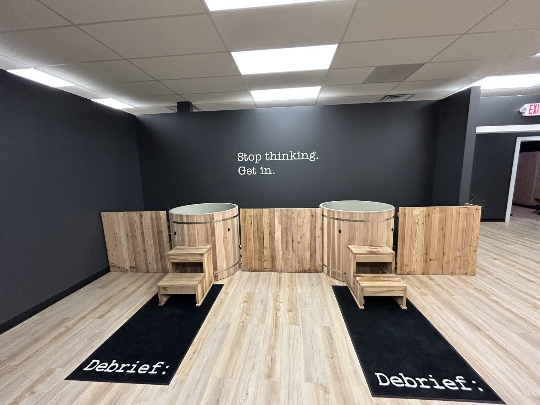 Debrief Recovery contrast therapy room with cold plunges and saunas